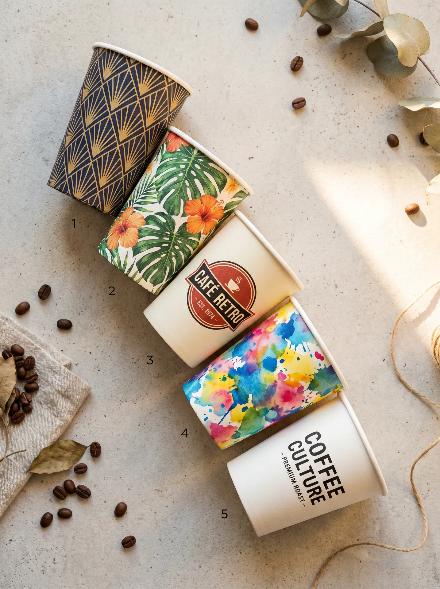 Custom printed paper cups with different brand designs on a flexographic production line — CupsPak factory