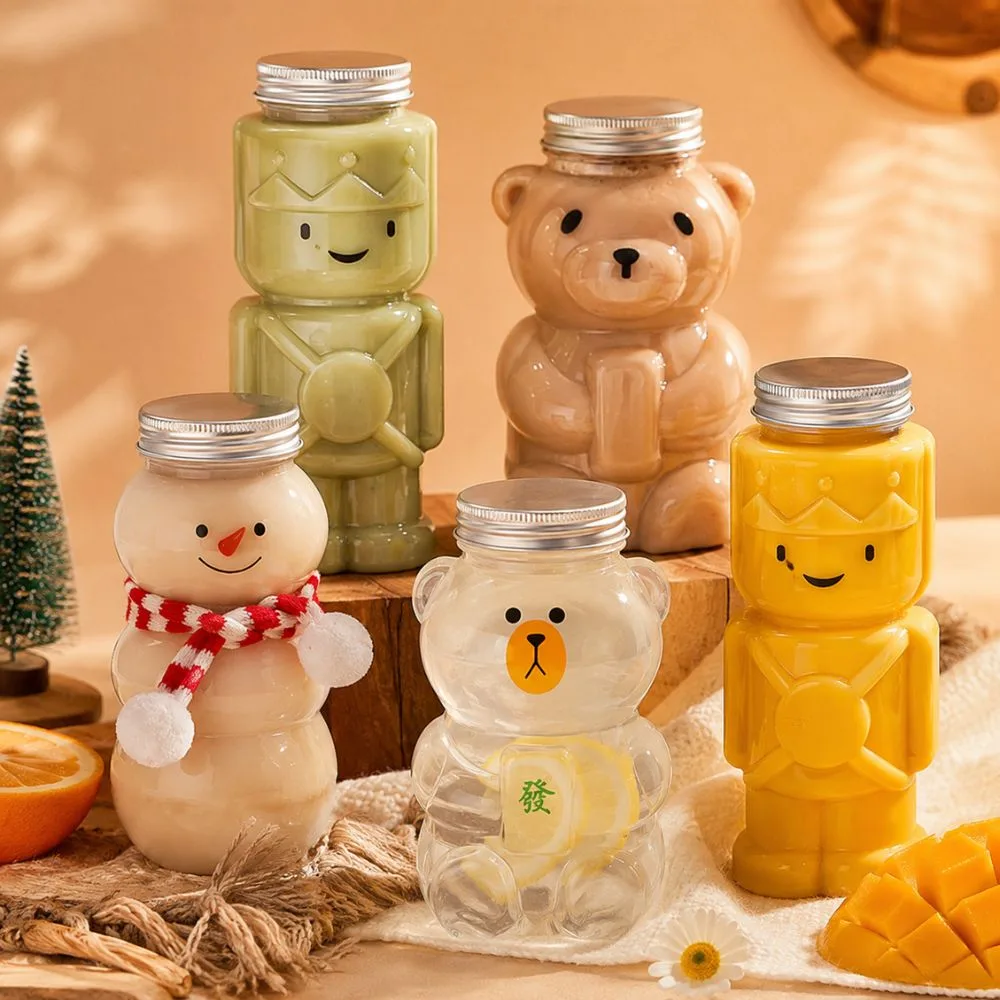 Shaped PET juice bottles — bear, snowman, robot and king character bottles with aluminum caps from stock specialty molds — CupsPak